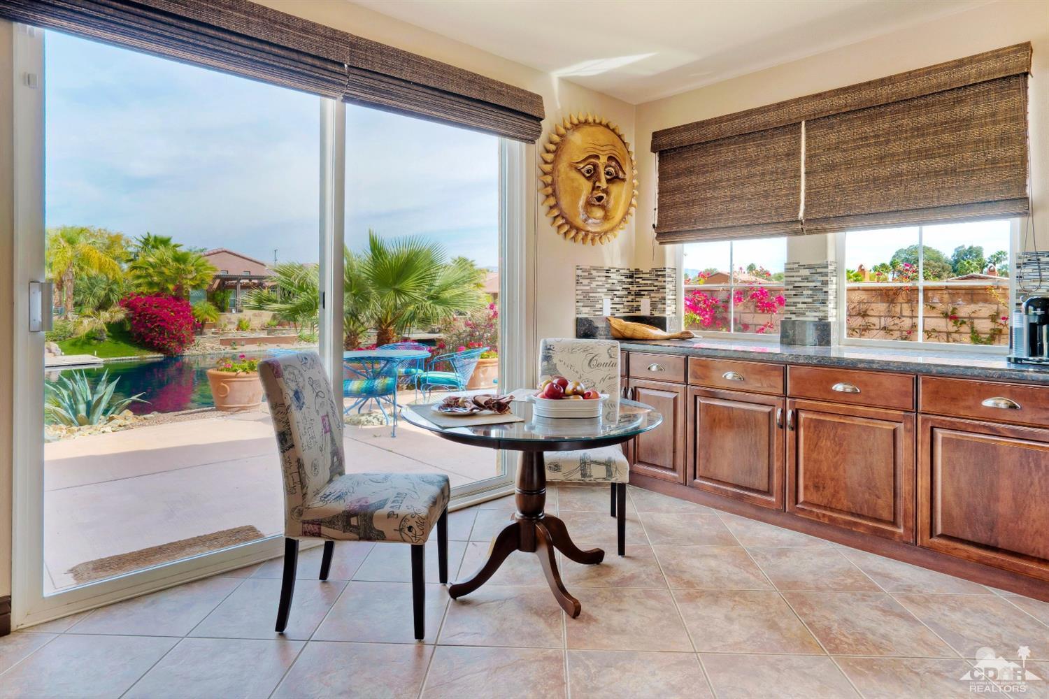 10 Via Santa Ramona Rancho Mirage, CA 92270 - Photo 48 of 78 a view of a dining room with furniture window and outside view