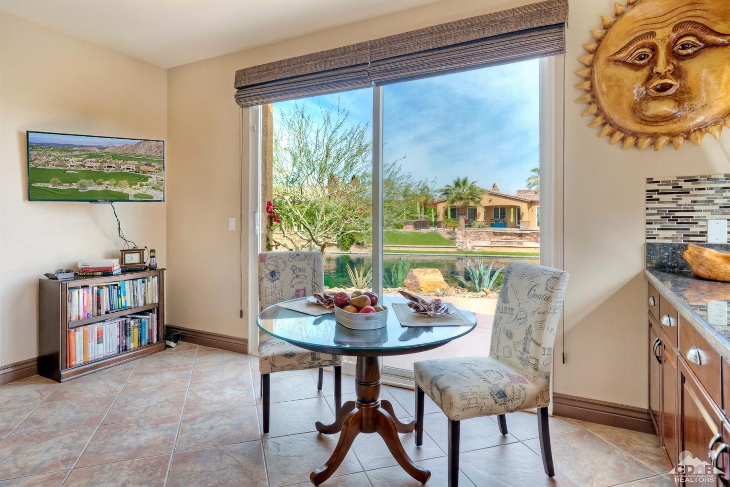 10 Via Santa Ramona Rancho Mirage, CA 92270 - Photo 49 of 78 a dining room with furniture and a window