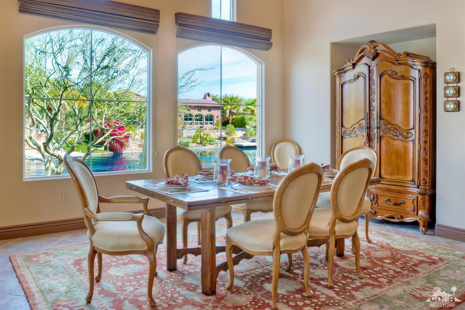 10 Via Santa Ramona Rancho Mirage, CA 92270 - Photo 55 of 78 a view of a dining room with furniture window and outside view