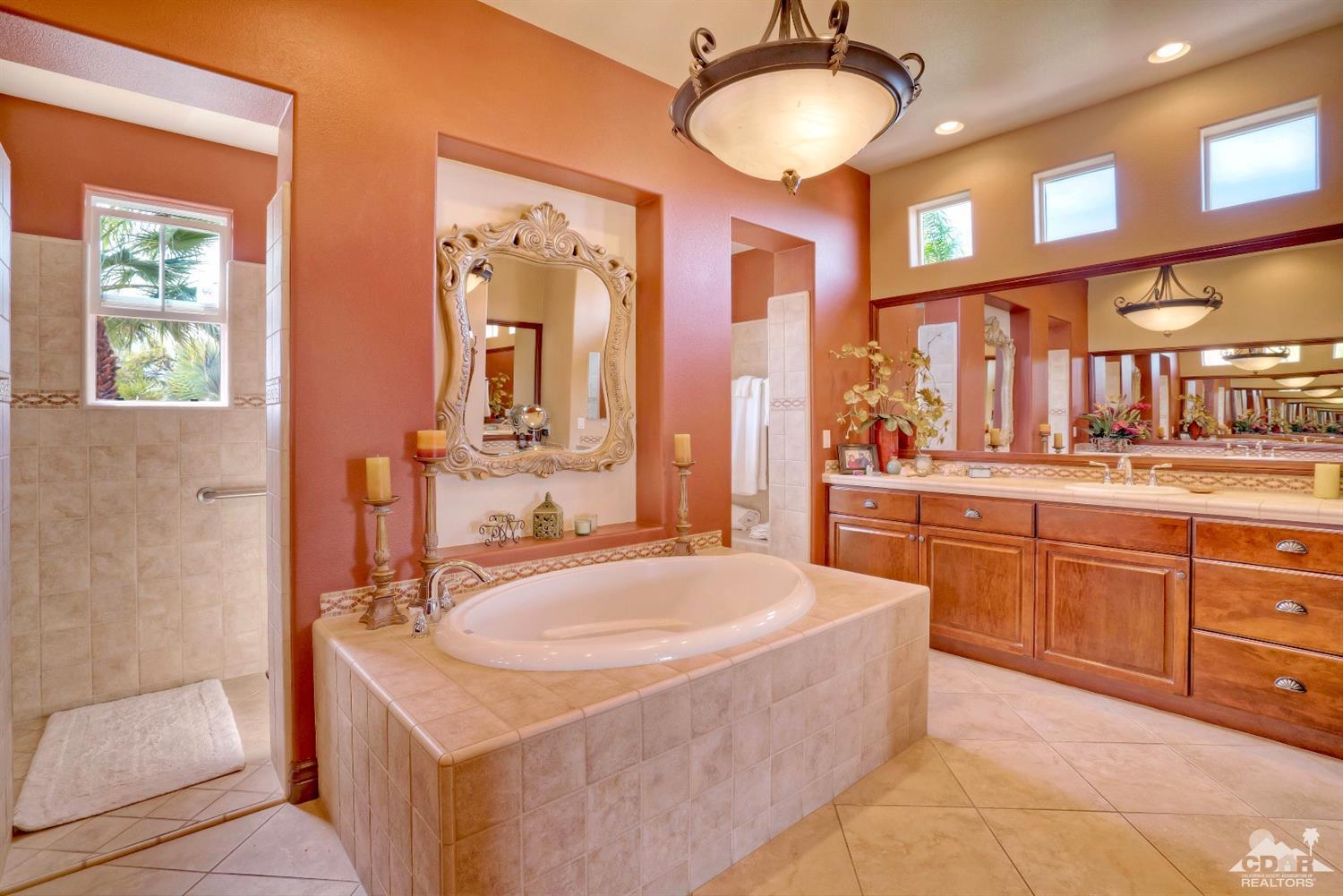 10 Via Santa Ramona Rancho Mirage, CA 92270 - Photo 70 of 78 a bathroom with a tub sink and mirror