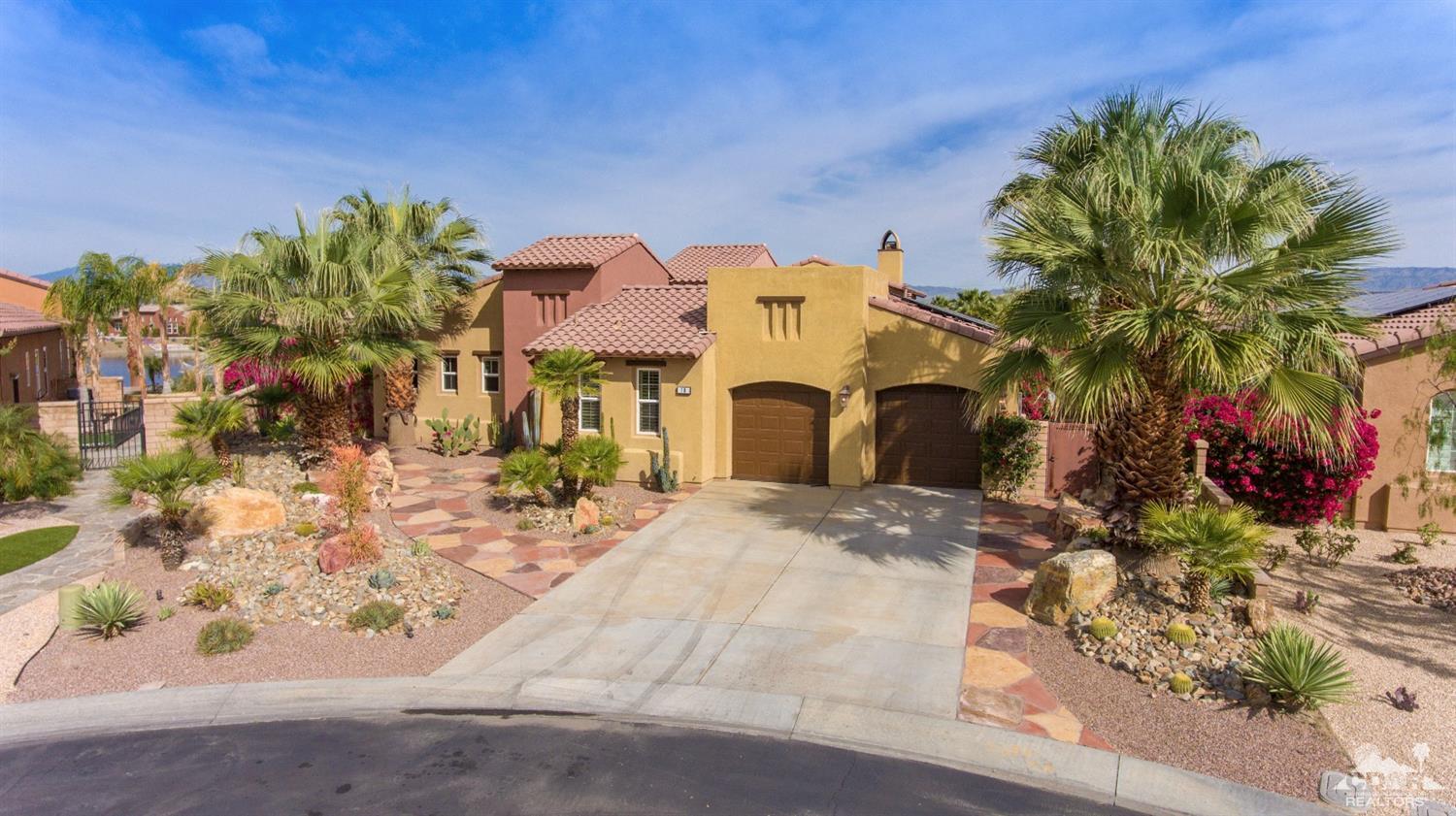 10 Via Santa Ramona Rancho Mirage, CA 92270 - Photo 10 of 78 a front view of a house with a yard