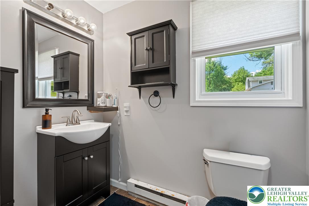 50 Kohls Road Northampton, PA 18067 - Photo 32 of 54 A well-appointed bathroom features a single vanity, ample storage, and natural illumination.