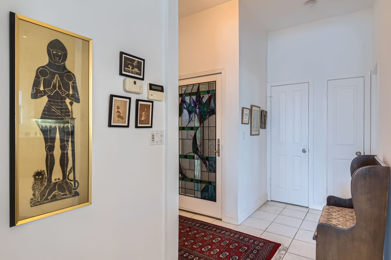1115 West 7th Street, Unit 202 Austin, TX 78703 - Photo 11 of 12 a view of a hallway with paintings on the wall
