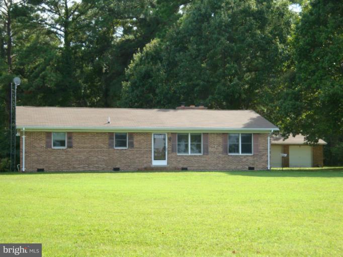 16236 Pine Tree Lane Ridge, MD 20680 - Photo 23 of 30 a view of house with a yard