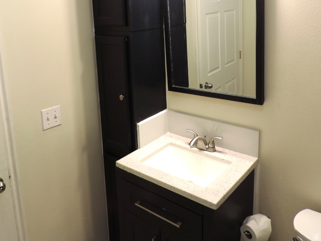 8198 North Cedar Springs Road, Unit 5 Eagle Mountain, UT 84005 - Photo 17 of 30 Bathroom with vanity and toilet