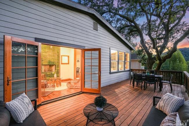 a outdoor space with furniture and wooden floor
