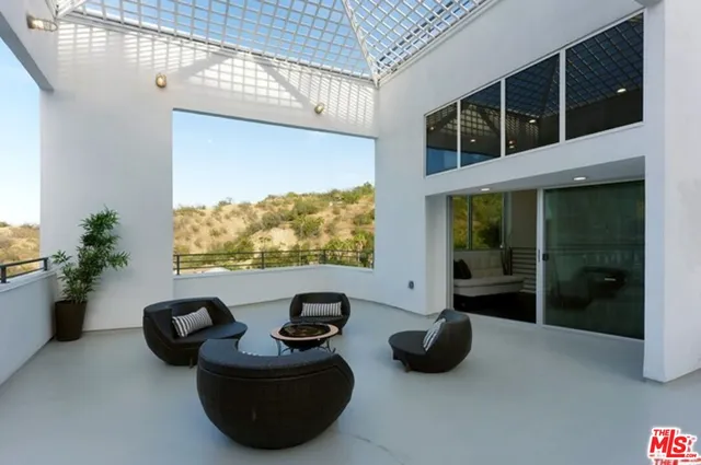 a room with furniture and window