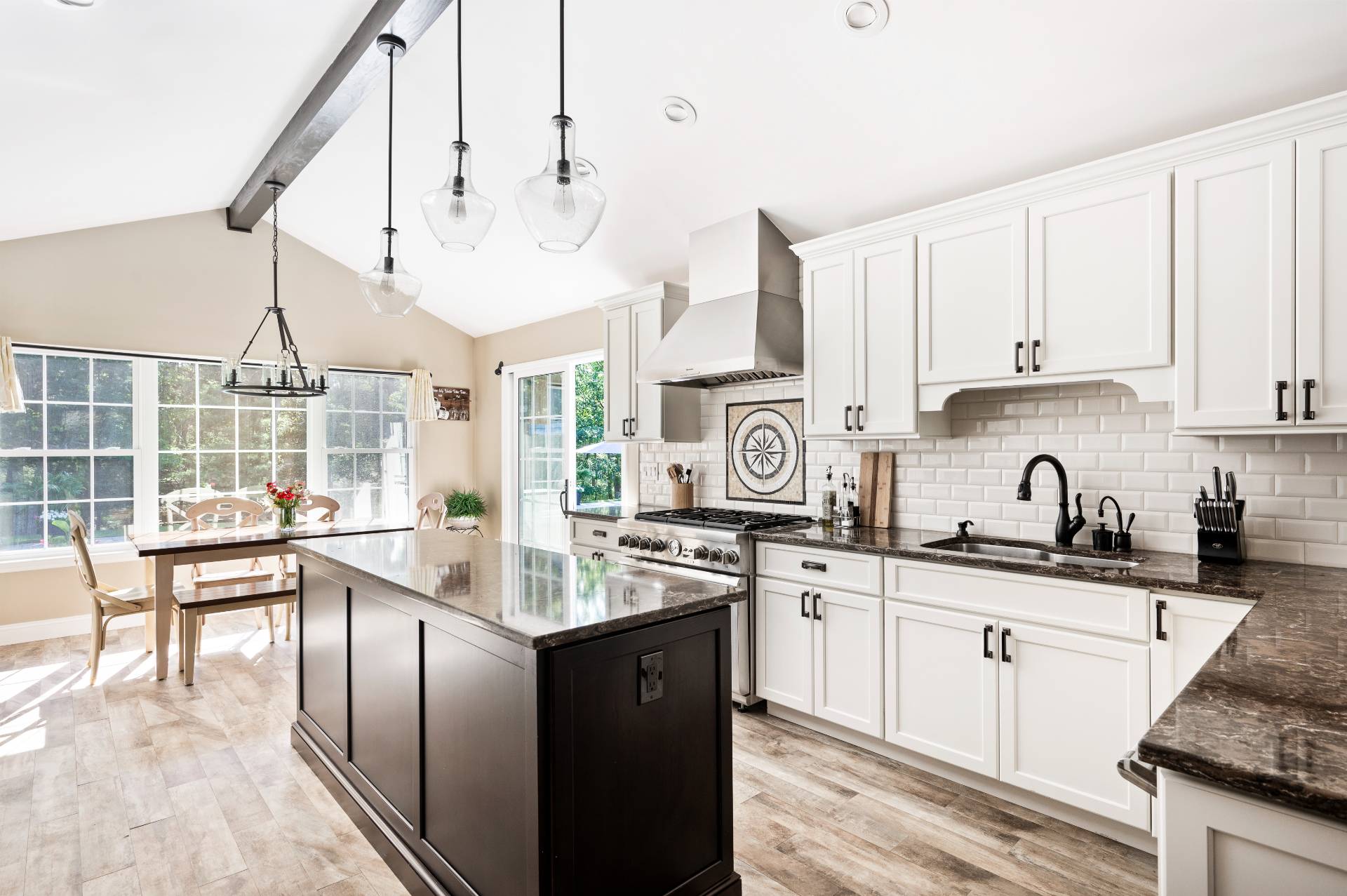 14 High Ridge Road East Hampton, NY 11937 - Photo 24 of 43 a kitchen with stainless steel appliances granite countertop a sink a stove and refrigerator