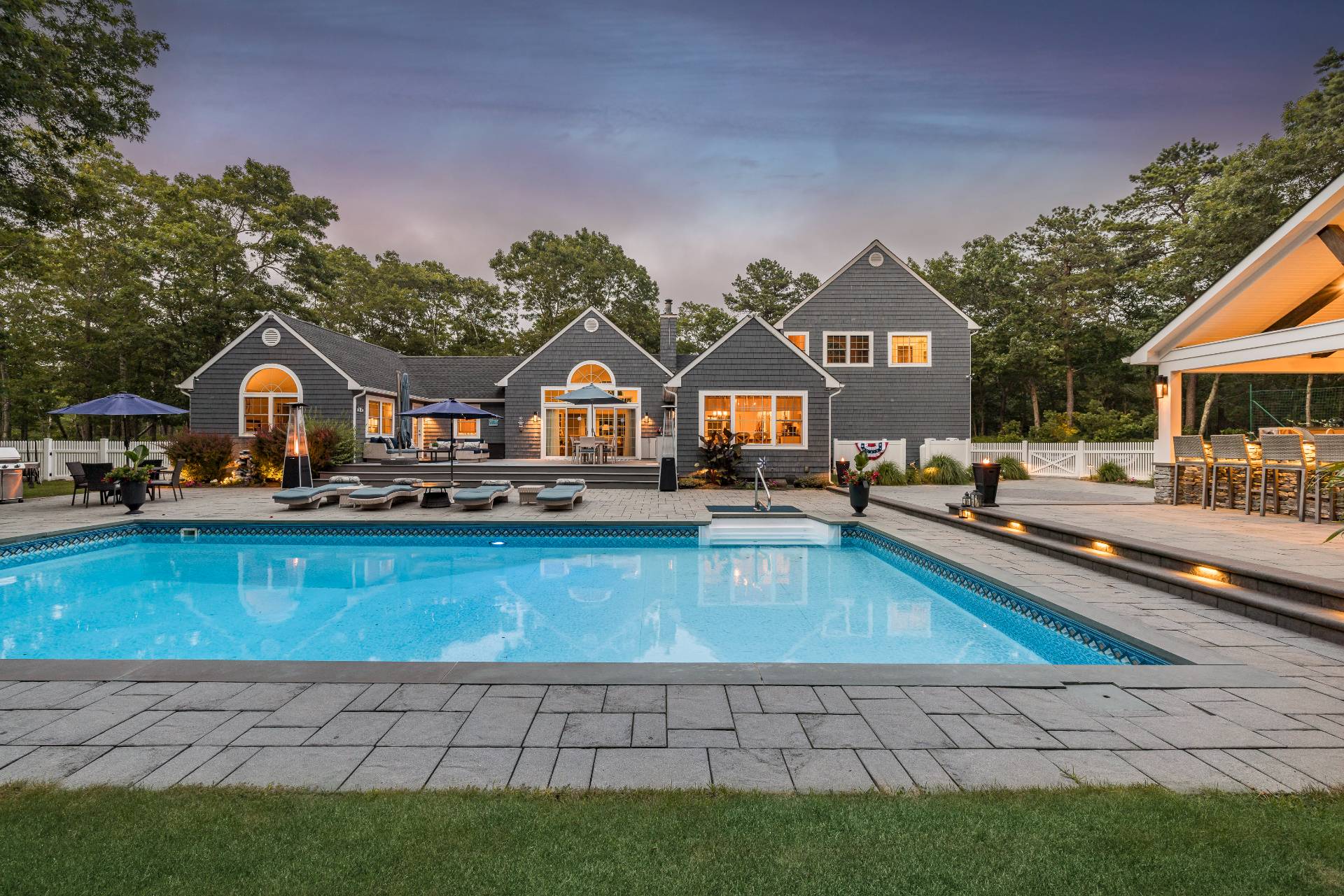 14 High Ridge Road East Hampton, NY 11937 - Photo 4 of 43 a view of swimming pool and lounge chair in front of house