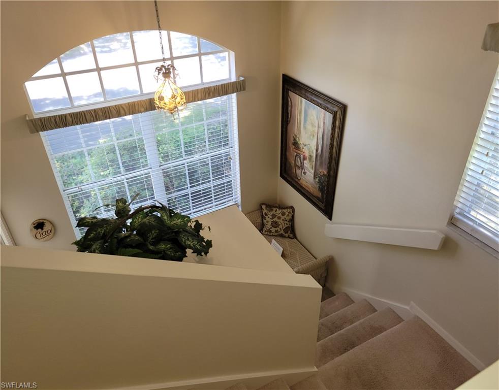 7435 Plumbago Bridge Road, Unit K201 Naples, FL 34109 - Photo 4 of 17 a view of a living room and a window