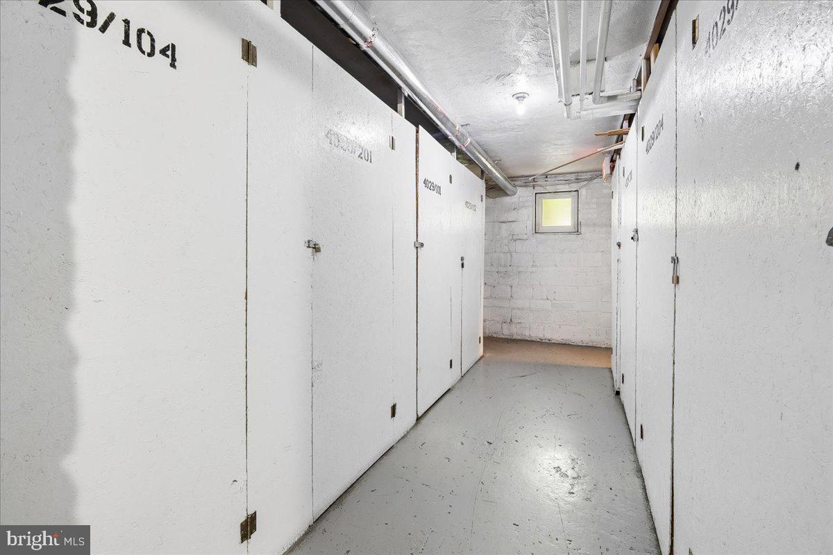 4029 Benton Street Northwest, Unit 302 Washington, DC 20007 - Photo 15 of 27 a view of hallway with stairs
