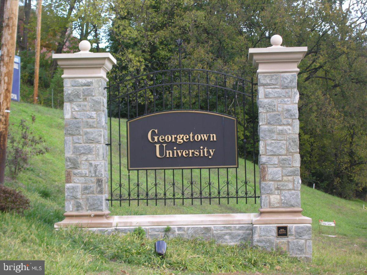 4029 Benton Street Northwest, Unit 302 Washington, DC 20007 - Photo 25 of 27 a sign on the side of the road