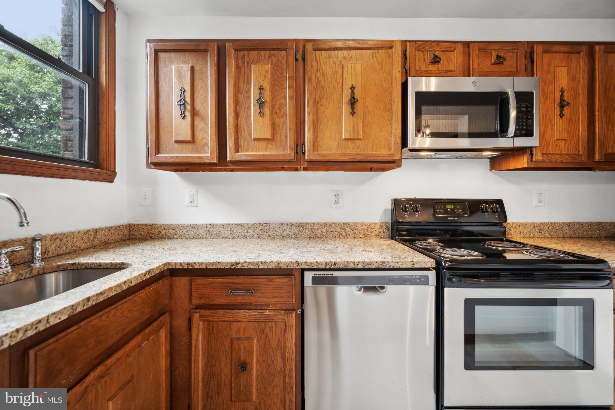 1661 Park Road Northwest, Unit 201 Washington, DC 20010 - Photo 12 of 28 Kitchen with granite countertops