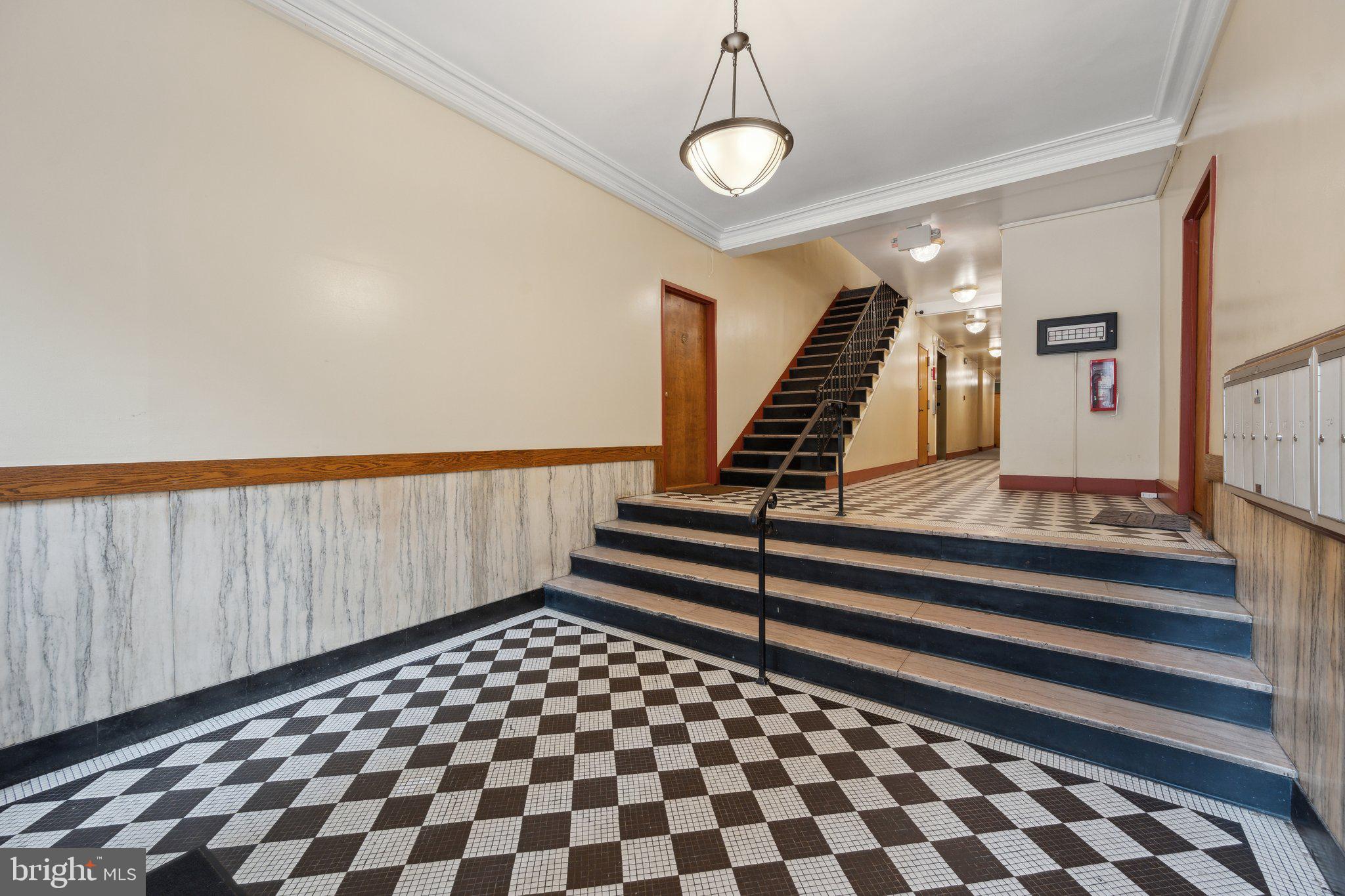 1661 Park Road Northwest, Unit 201 Washington, DC 20010 - Photo 22 of 28 Main lobby with mailboxes and elevator