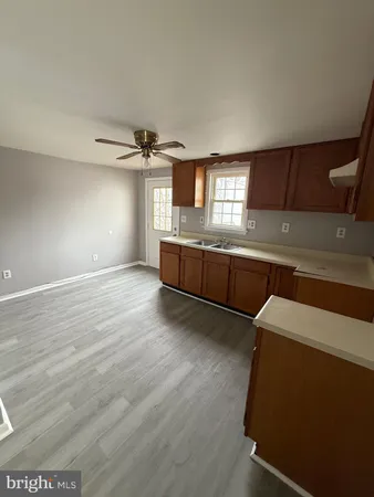 a view of a kitchen with a sink