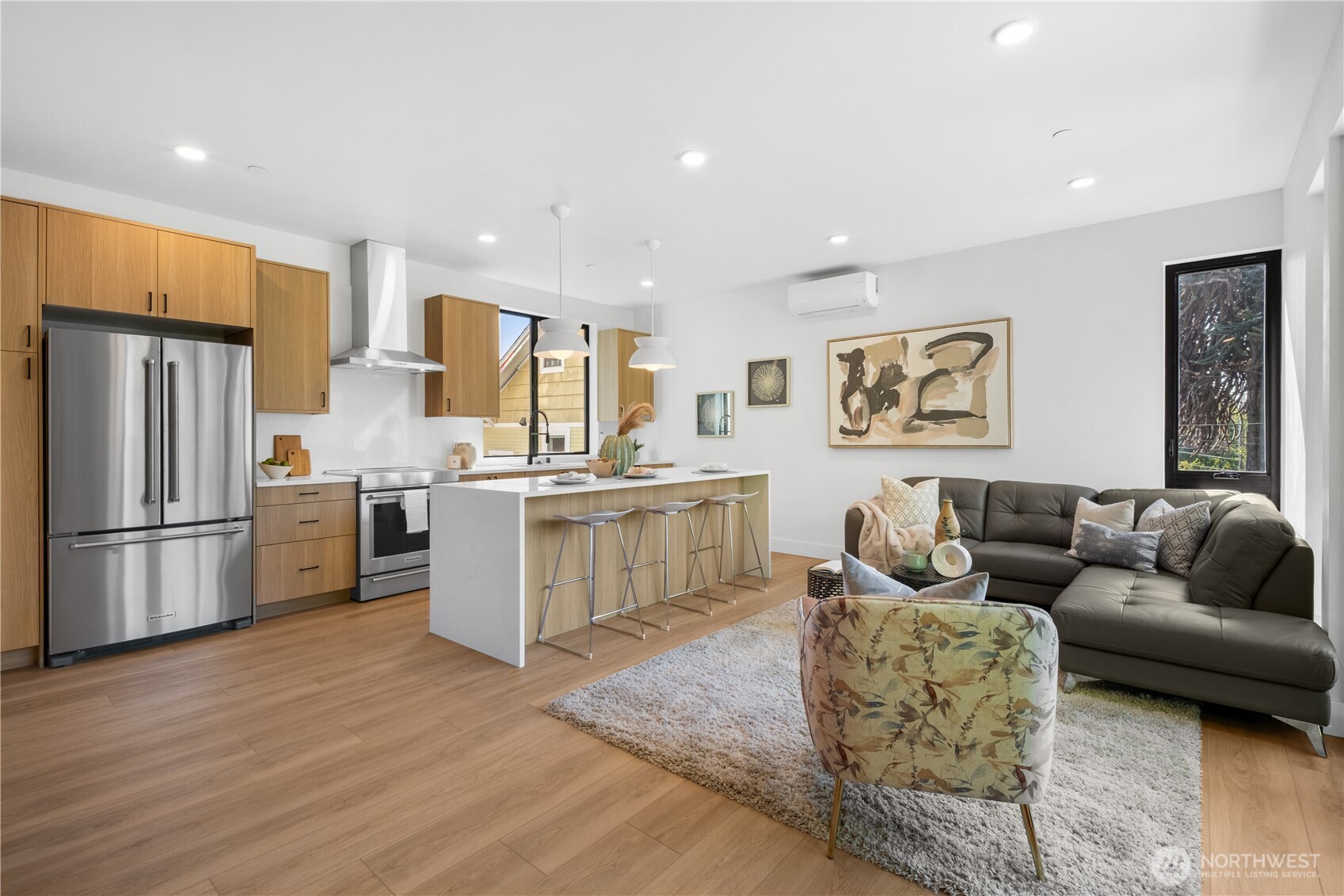 220 21st Avenue East Seattle, WA 98112 - Photo 14 of 38 a living room with stainless steel appliances furniture and a kitchen view