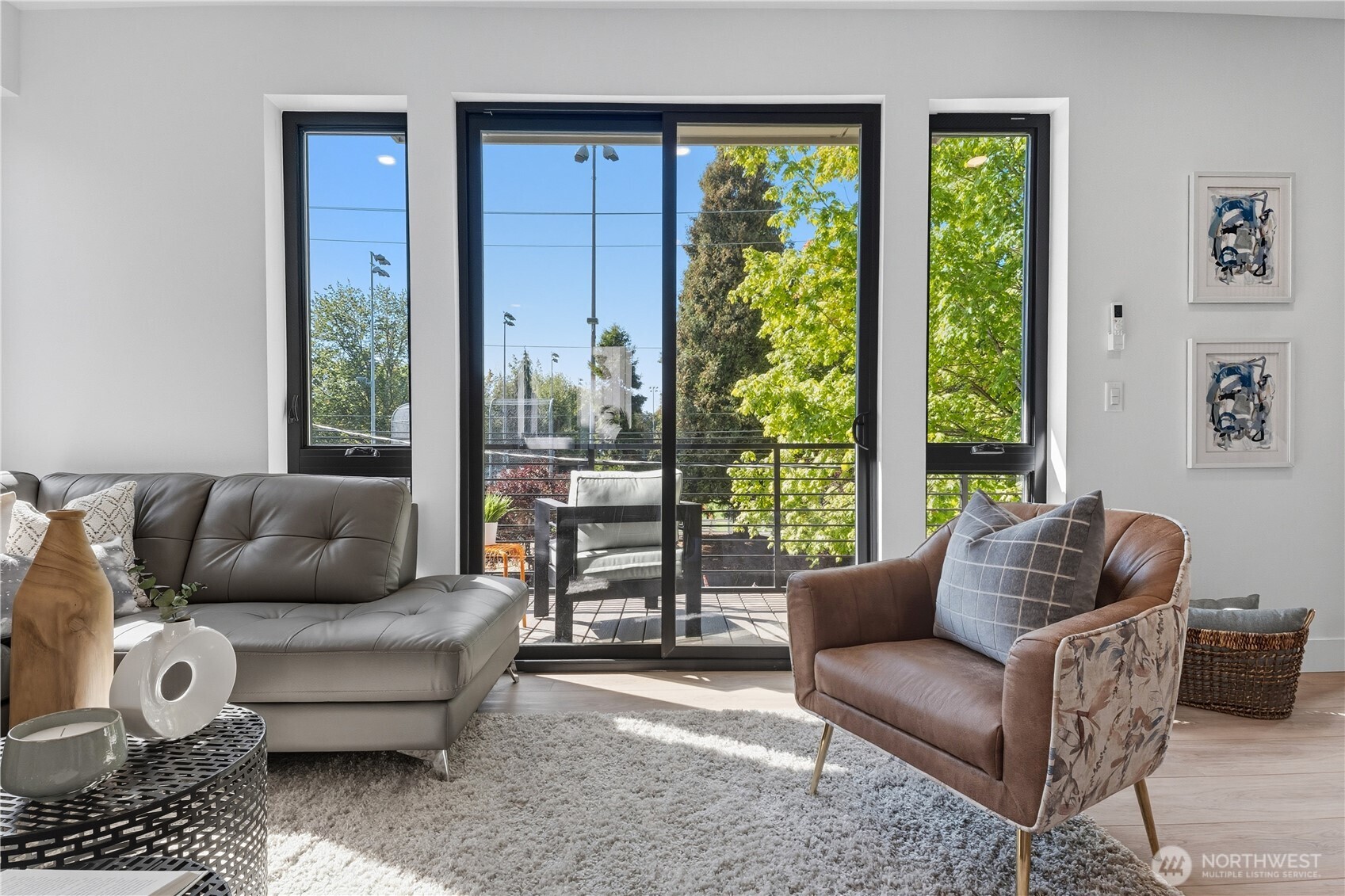220 21st Avenue East Seattle, WA 98112 - Photo 16 of 38 a living room with furniture and a large window
