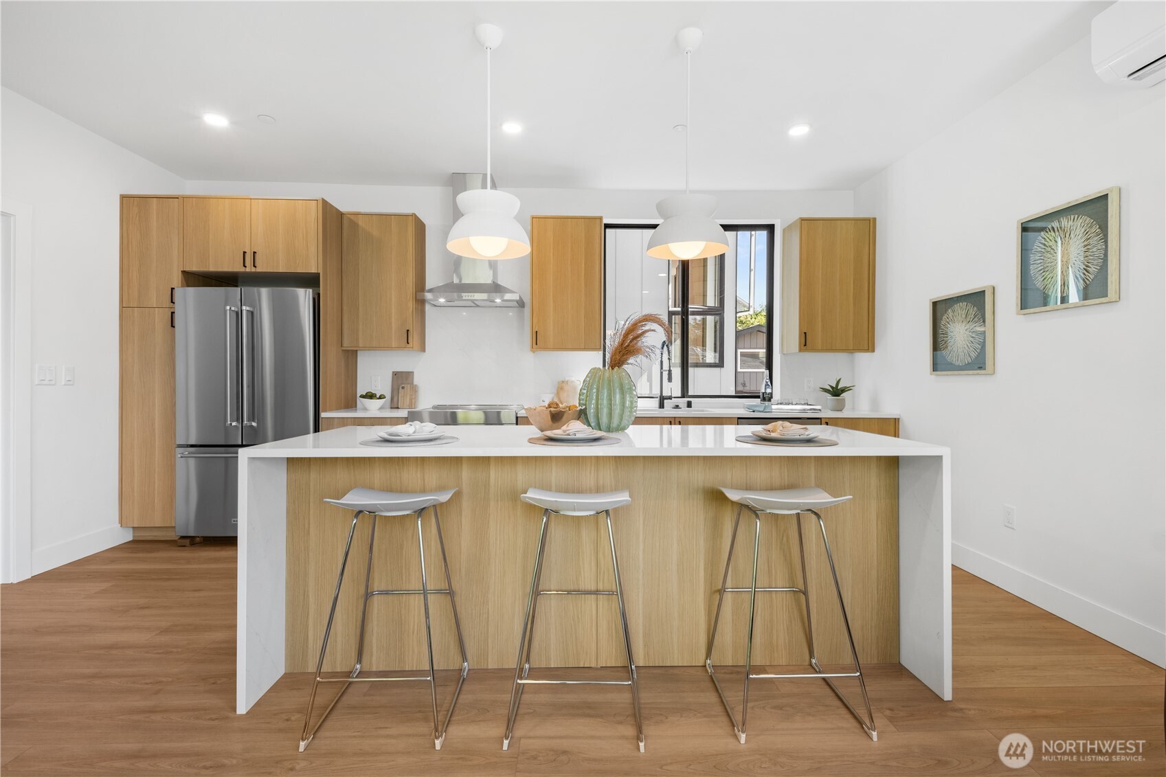 220 21st Avenue East Seattle, WA 98112 - Photo 18 of 38 a bathroom with a sink and a mirror