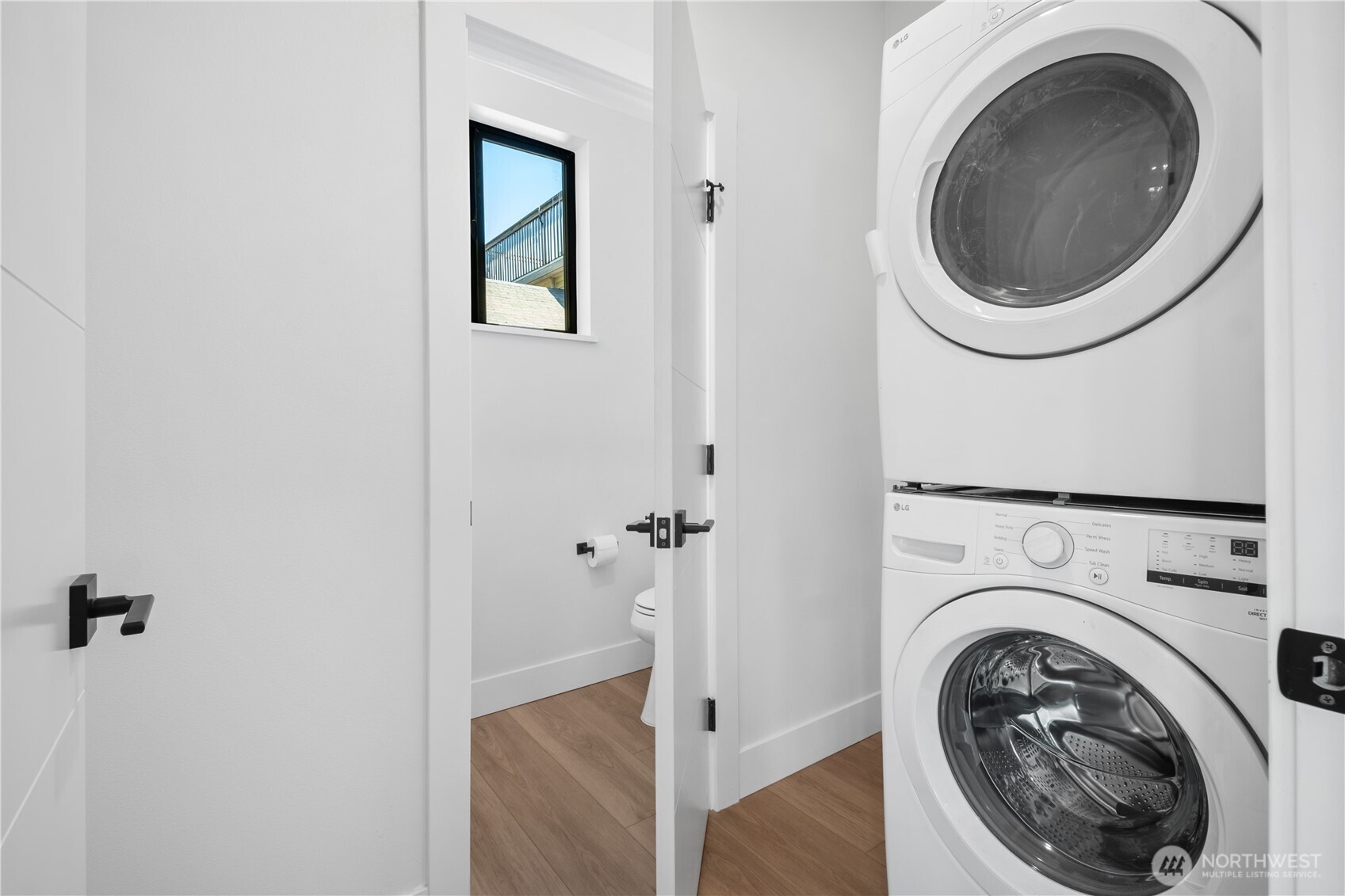 220 21st Avenue East Seattle, WA 98112 - Photo 21 of 38 a utility room with dryer and washer