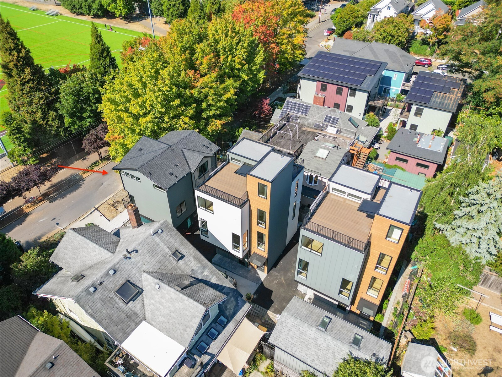 220 21st Avenue East Seattle, WA 98112 - Photo 35 of 38 an aerial view of multiple houses with yard