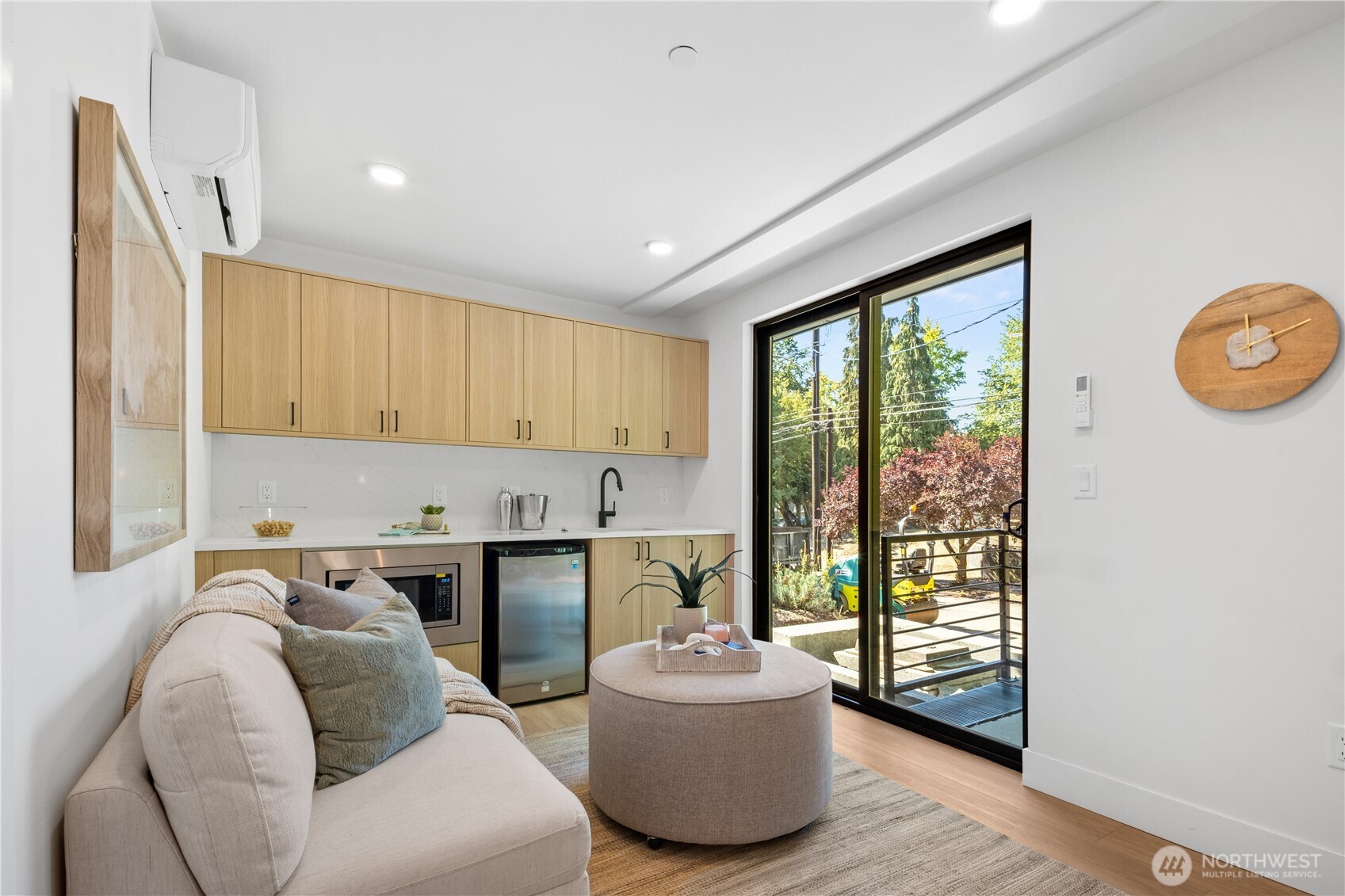 220 21st Avenue East Seattle, WA 98112 - Photo 5 of 38 a living room with furniture and a window