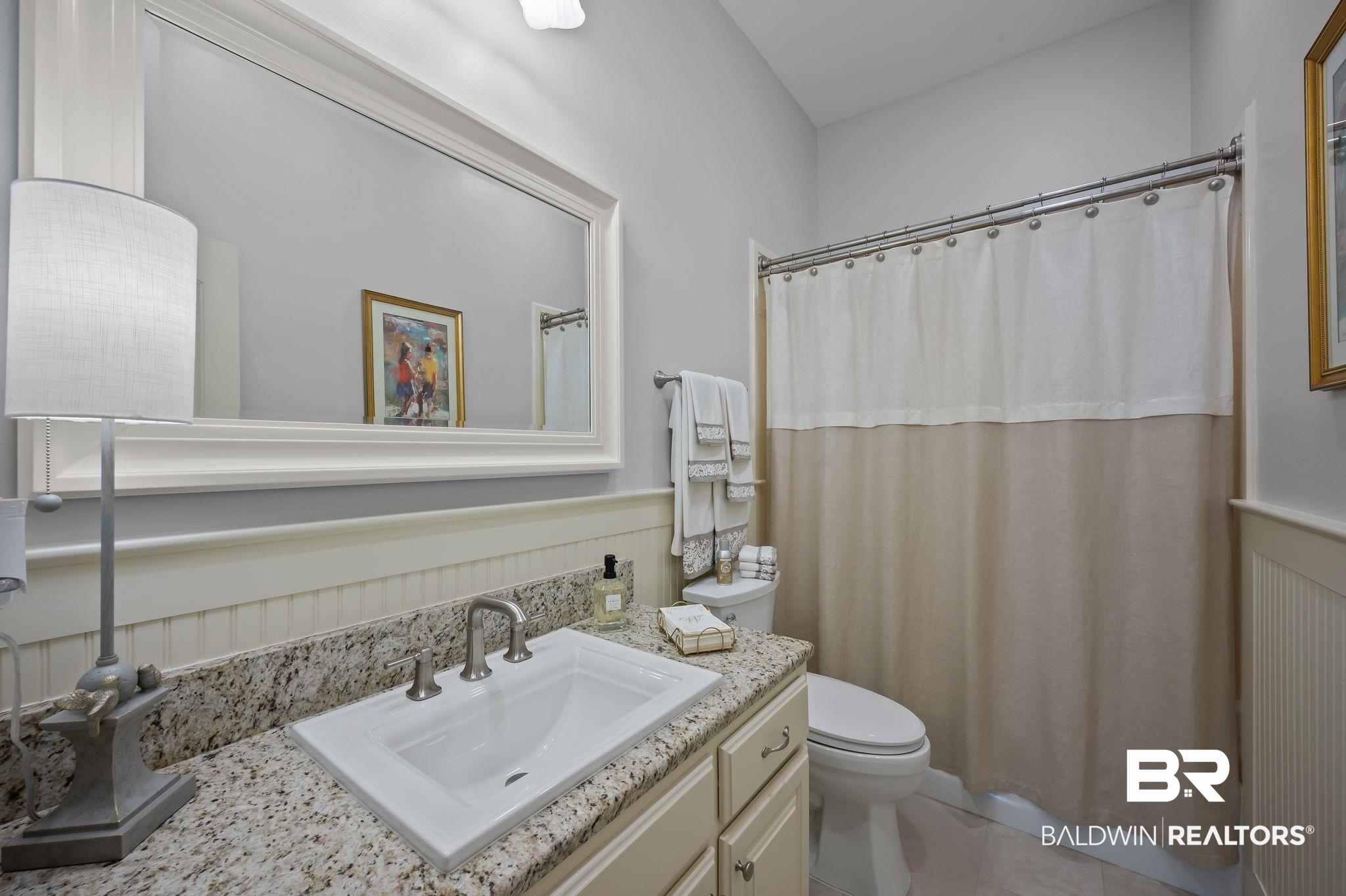 905 Buttercup Lane Foley, AL 36535 - Photo 33 of 47 Full bath with vanity, tile patterned flooring, and curtained shower