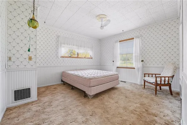 a living room with couch and a table