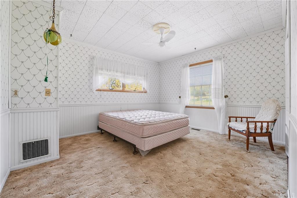 6453 Old Pulaski Road New Wilmington, PA 16142 - Photo 16 of 28 a living room with couch and a table