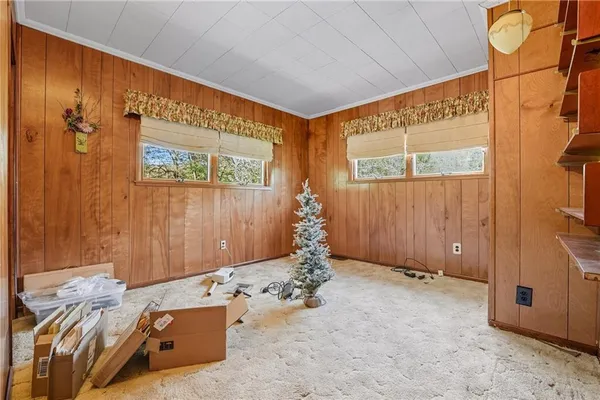 a bed room with a bed and a table