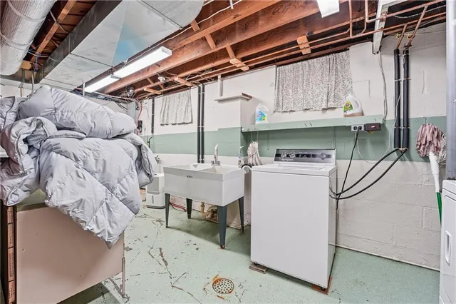 a utility room with cabinets