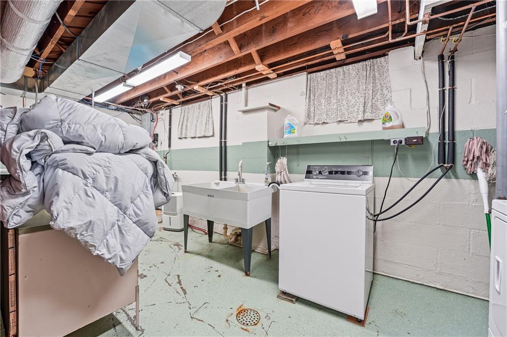6453 Old Pulaski Road New Wilmington, PA 16142 - Photo 21 of 28 a utility room with cabinets