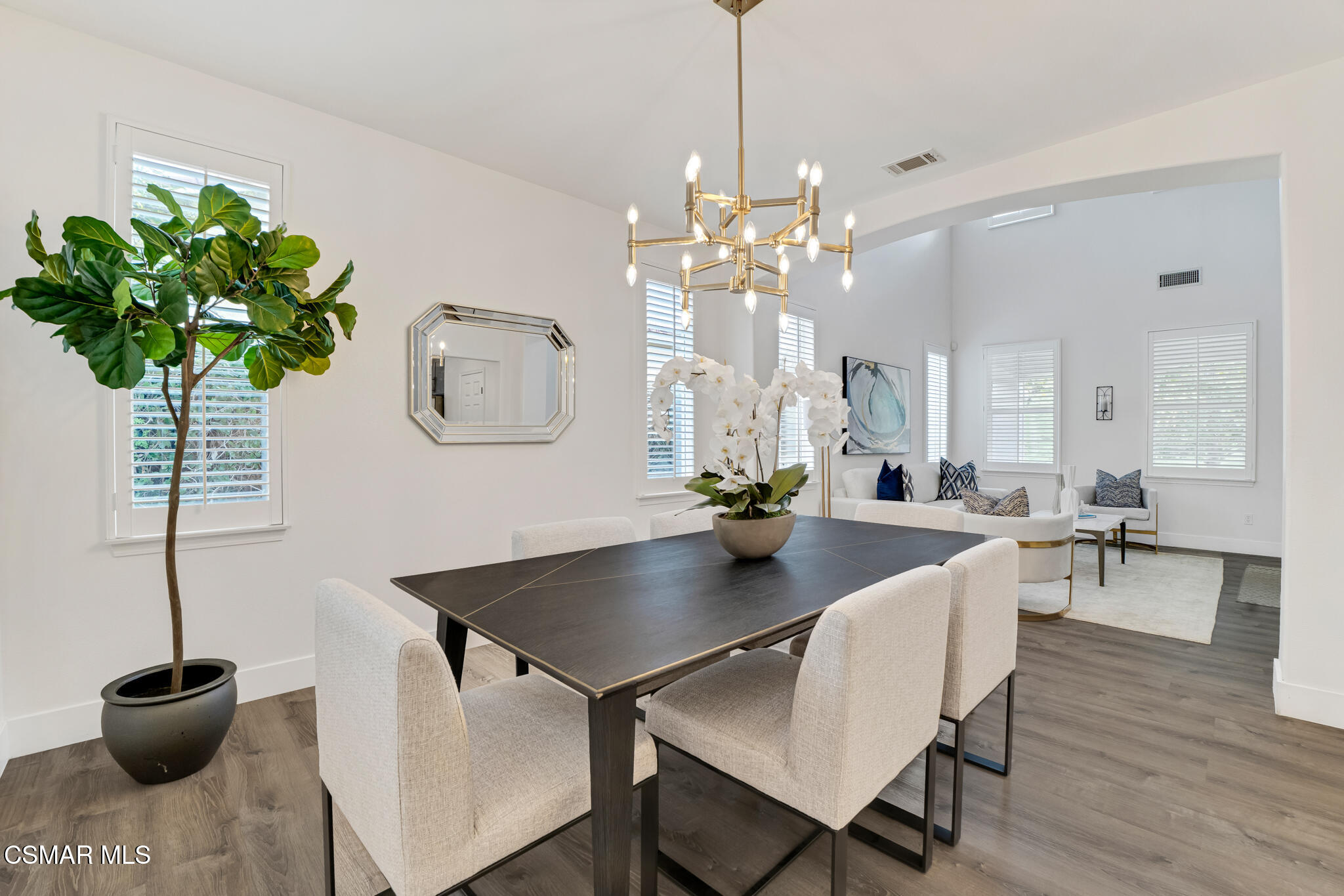 2339 Rudolph Drive Simi Valley, CA 93065 - Photo 11 of 61 a view of a dining room with furniture and wooden floor