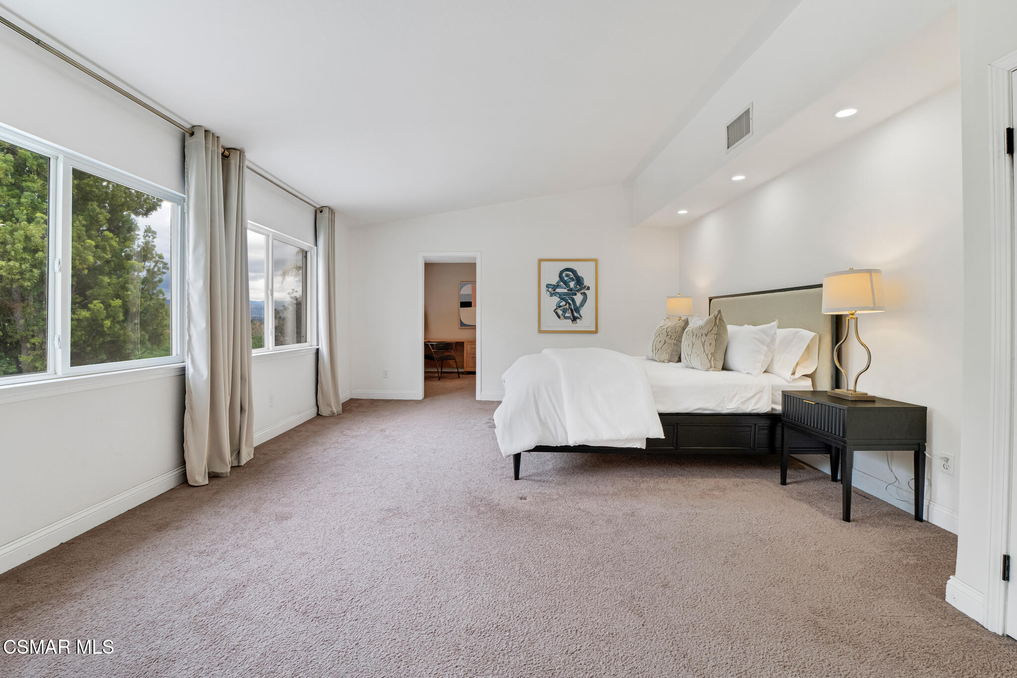 2339 Rudolph Drive Simi Valley, CA 93065 - Photo 21 of 61 a spacious bedroom with a bed and a window