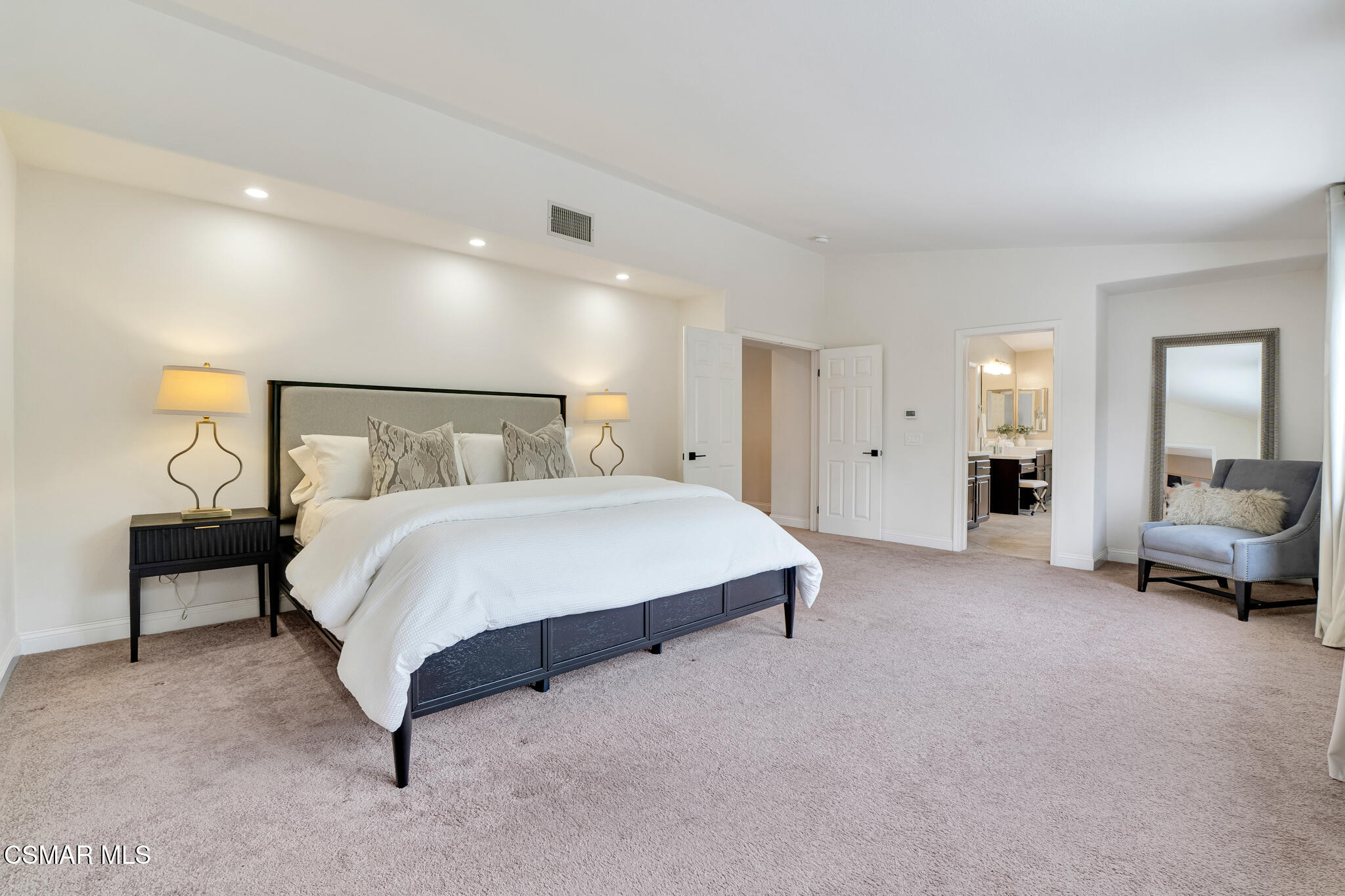 2339 Rudolph Drive Simi Valley, CA 93065 - Photo 24 of 61 a spacious bedroom with a bed and a couch