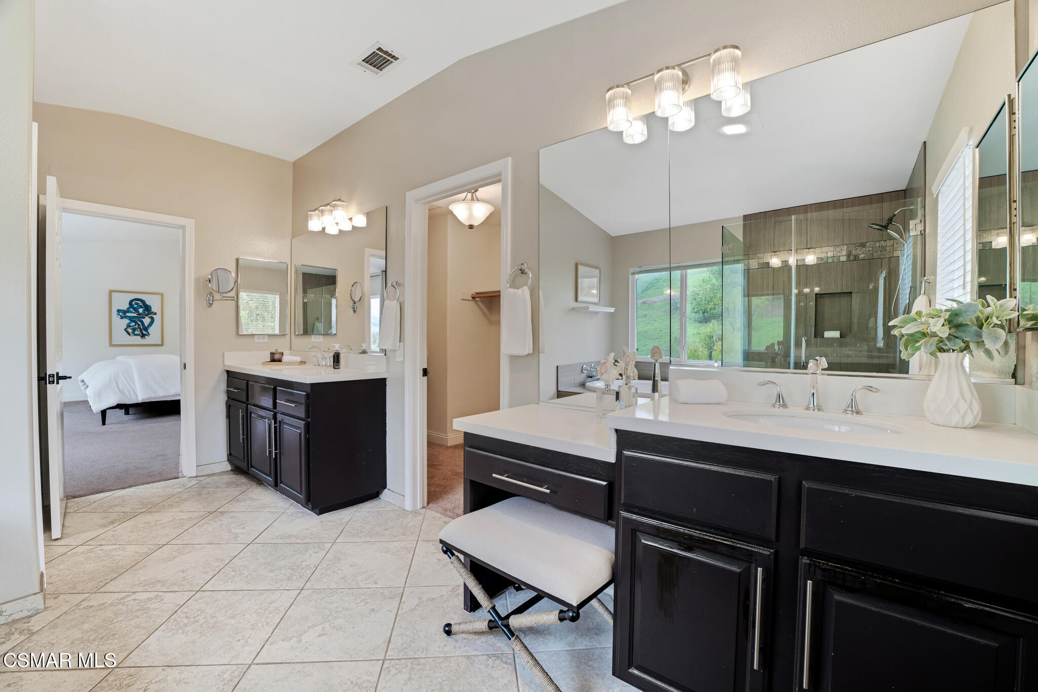 2339 Rudolph Drive Simi Valley, CA 93065 - Photo 25 of 61 a spacious bathroom with a sink double vanity and a mirror