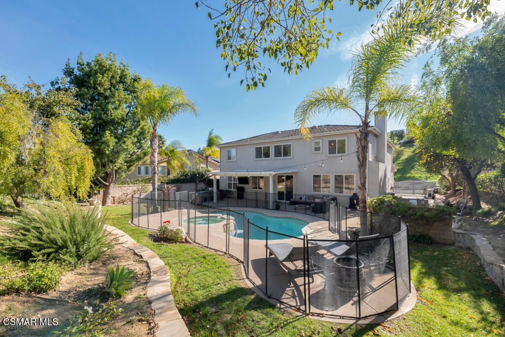 2339 Rudolph Drive Simi Valley, CA 93065 - Photo 36 of 61 a view of a house with swimming pool and sitting area