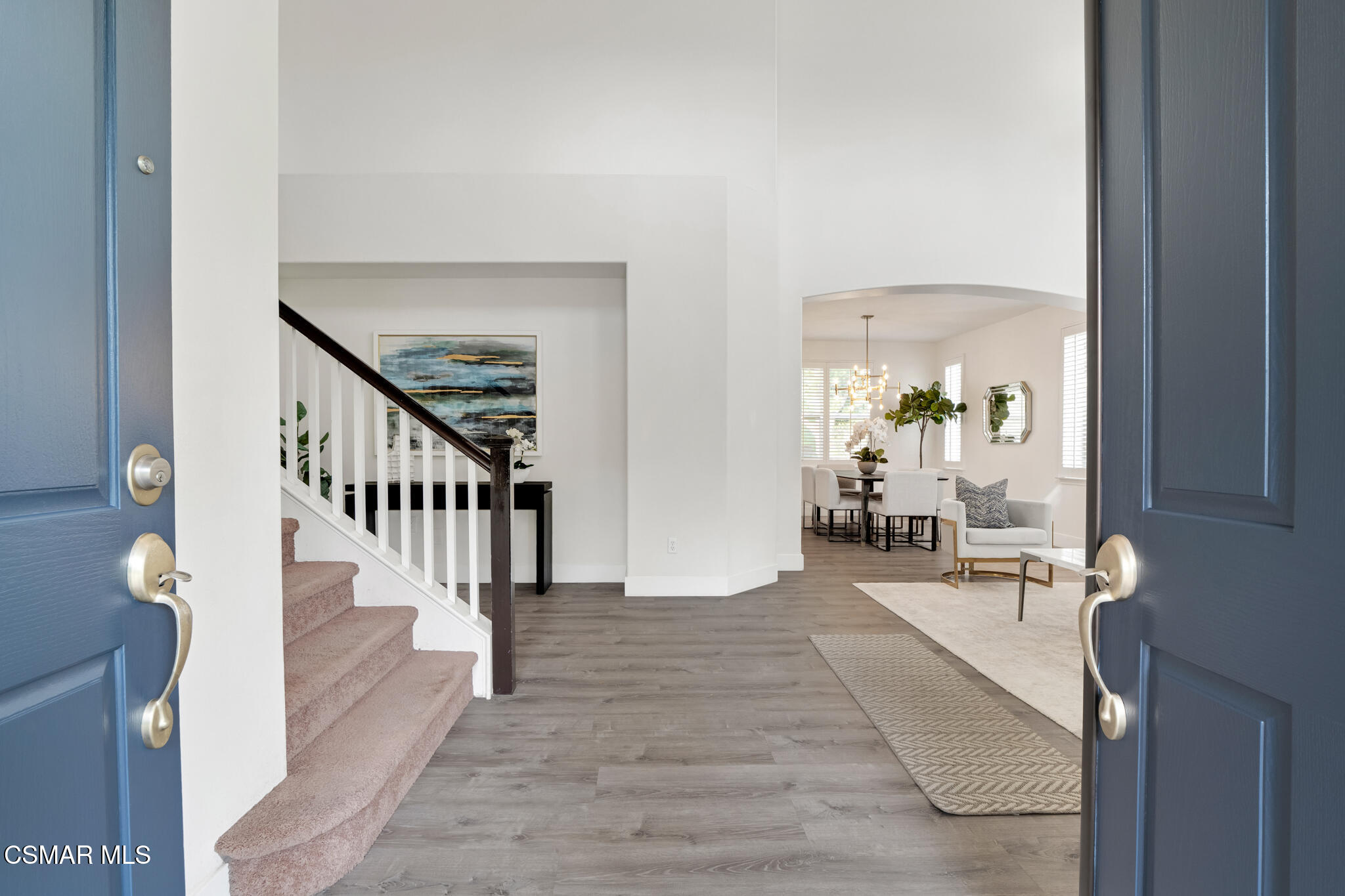 2339 Rudolph Drive Simi Valley, CA 93065 - Photo 5 of 61 a view of a hallway with wooden floor and furniture
