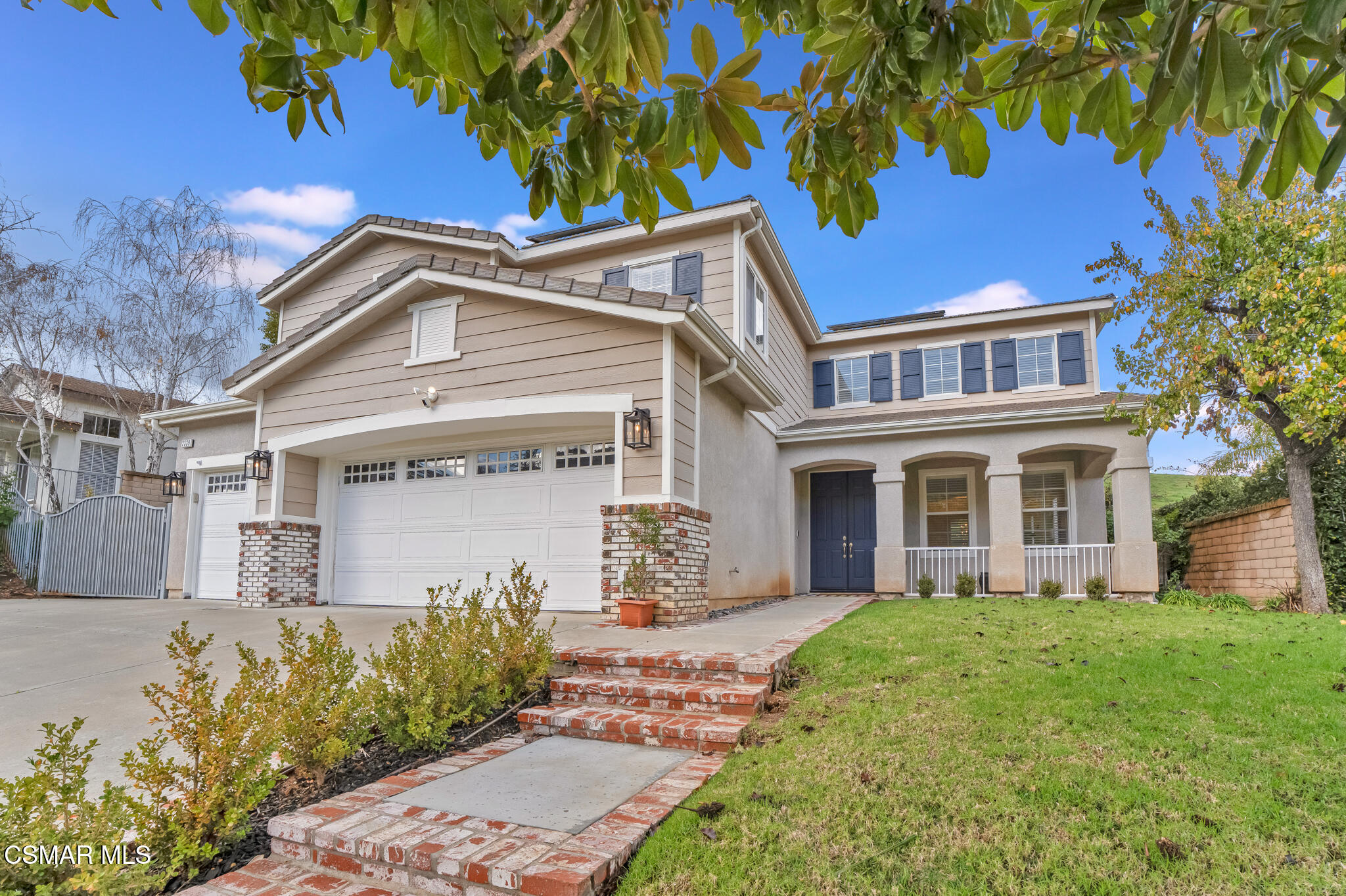2339 Rudolph Drive Simi Valley, CA 93065 - Photo 57 of 61 a front view of a house with a garden