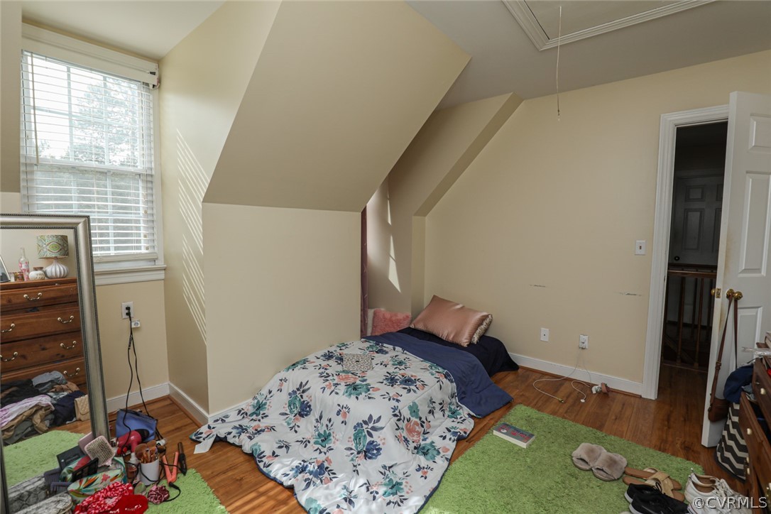 13120 Hensley Road Midlothian, VA 23112 - Photo 23 of 50 a bedroom with a bed and a window