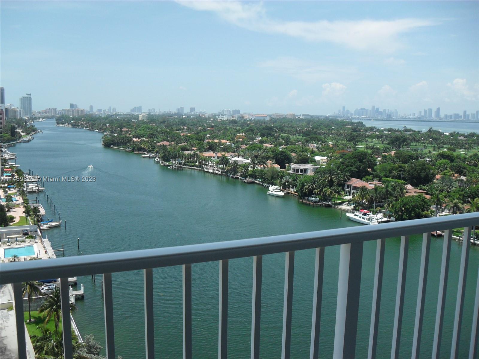 5838 Collins Avenue, Unit PHF Miami Beach, FL 33140 - Photo 1 of 13 a view of city and lake