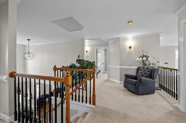 a bedroom with a bed and a flat screen television