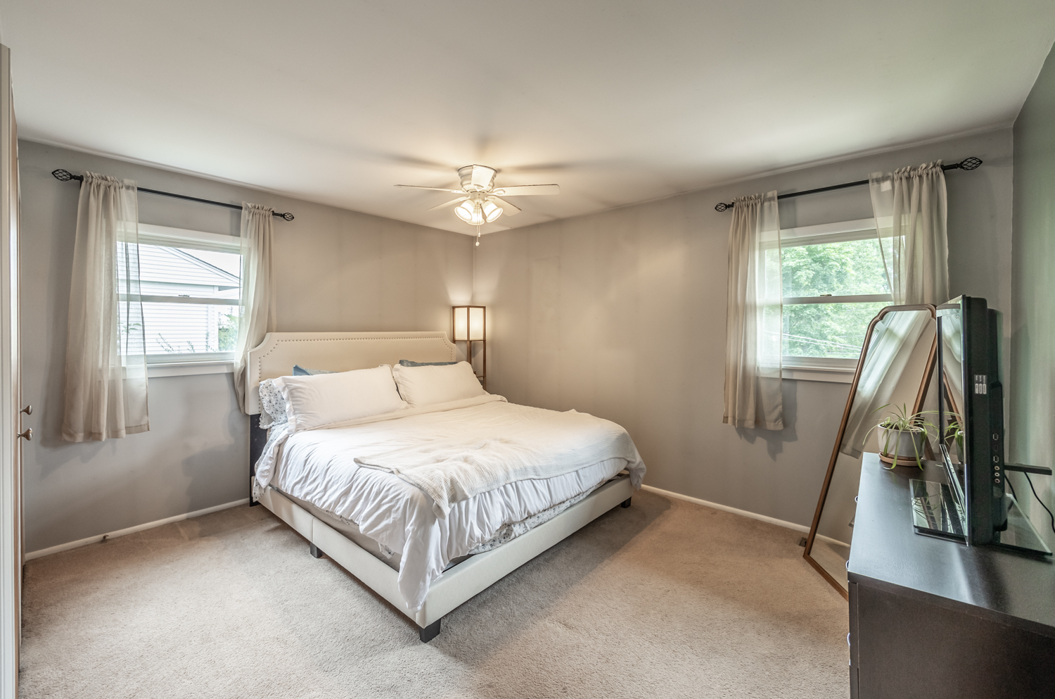 503 Ridge Circle Streamwood, IL 60107 - Photo 11 of 25 a bedroom with a bed and a walk in closet