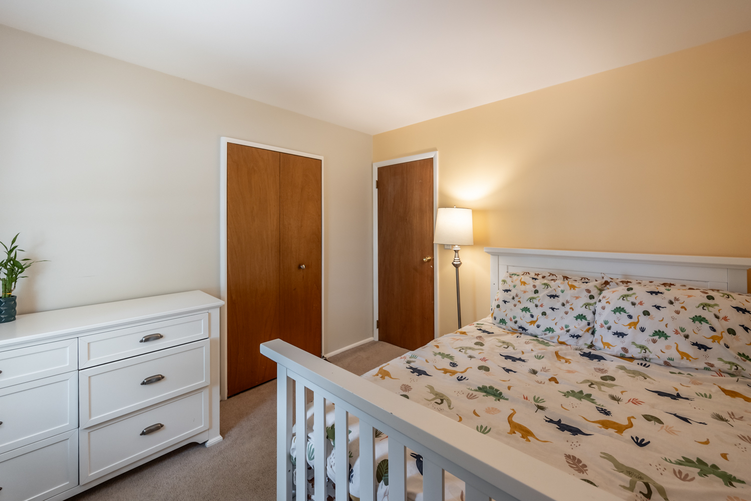 503 Ridge Circle Streamwood, IL 60107 - Photo 13 of 25 a bedroom with a bed and a dresser in it