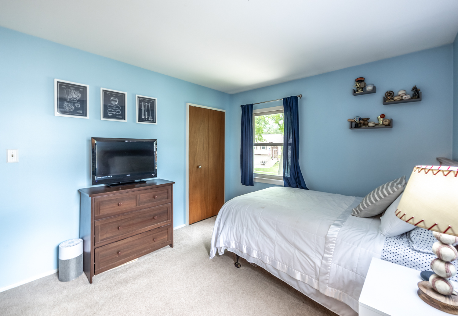 503 Ridge Circle Streamwood, IL 60107 - Photo 16 of 25 a bedroom with a bed and a flat screen tv