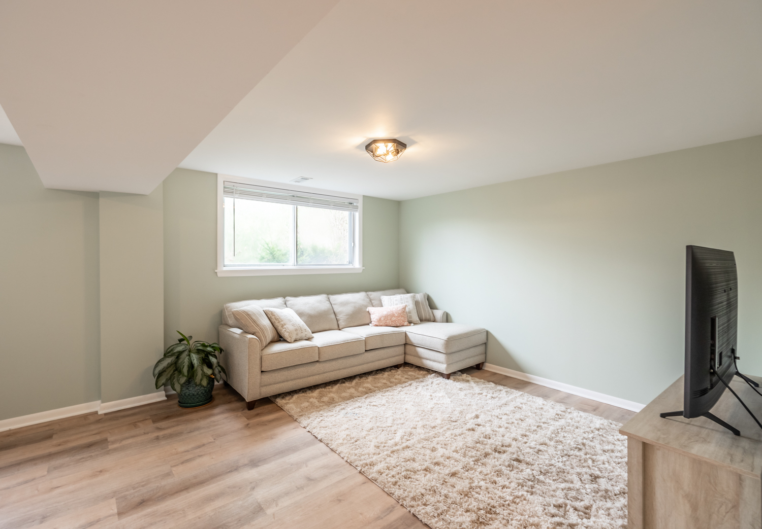 503 Ridge Circle Streamwood, IL 60107 - Photo 19 of 25 a living room with furniture and a flat screen tv