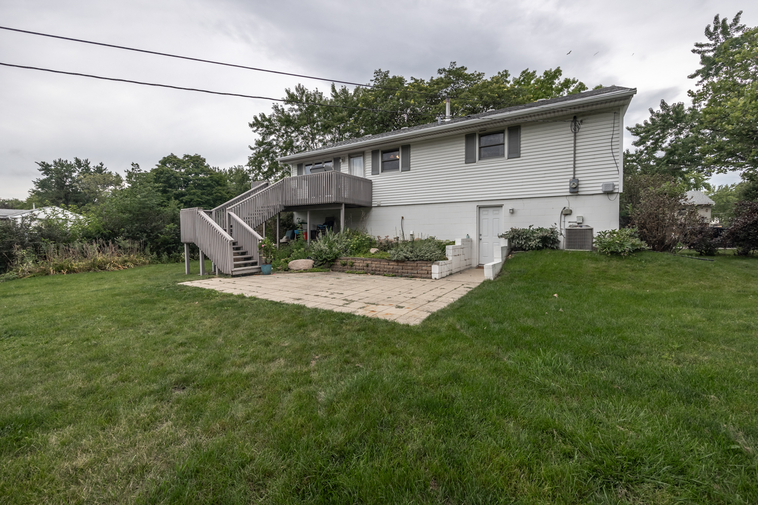 503 Ridge Circle Streamwood, IL 60107 - Photo 24 of 25 a backyard of a house with table and chairs