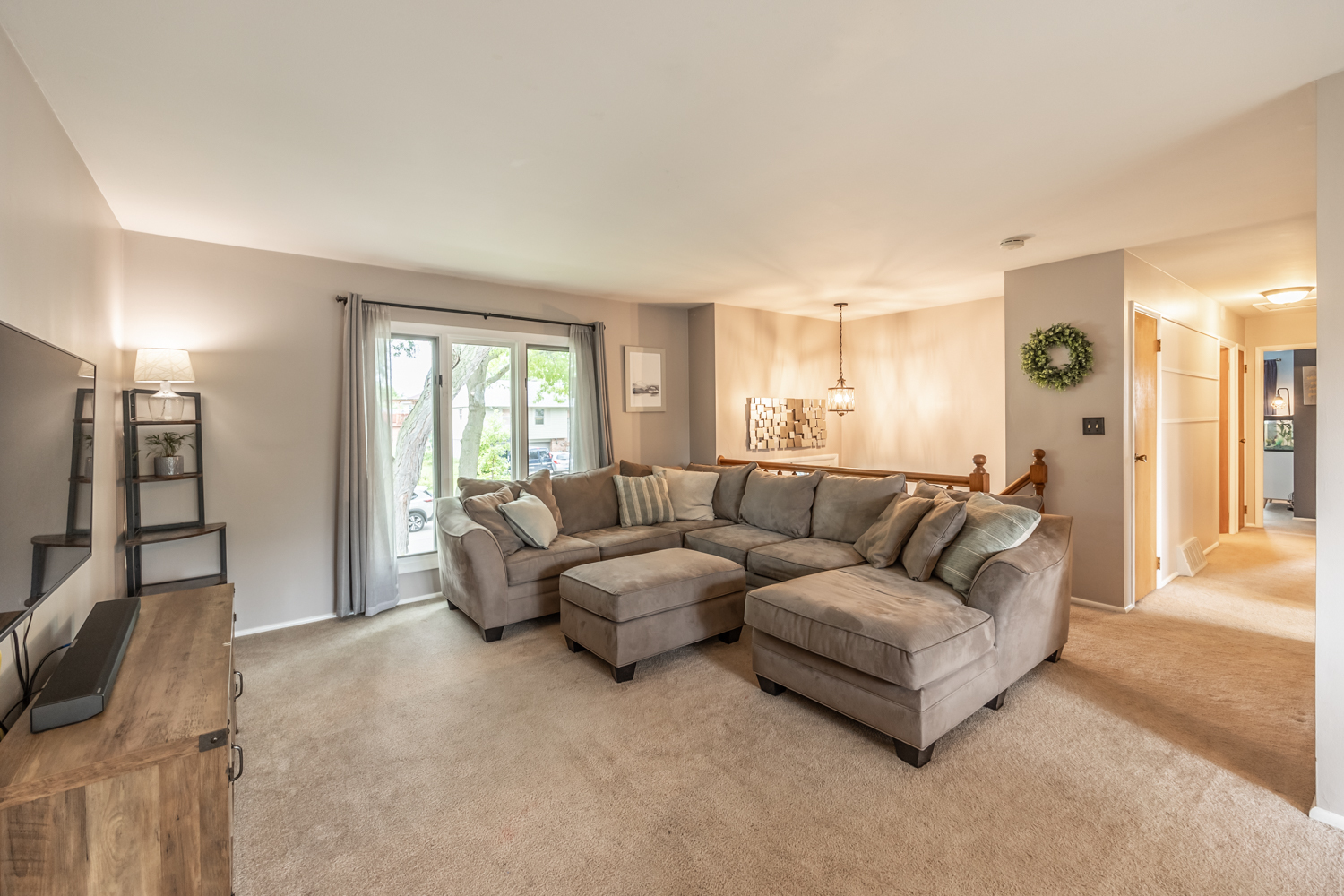 503 Ridge Circle Streamwood, IL 60107 - Photo 4 of 25 a living room with furniture and a flat screen tv
