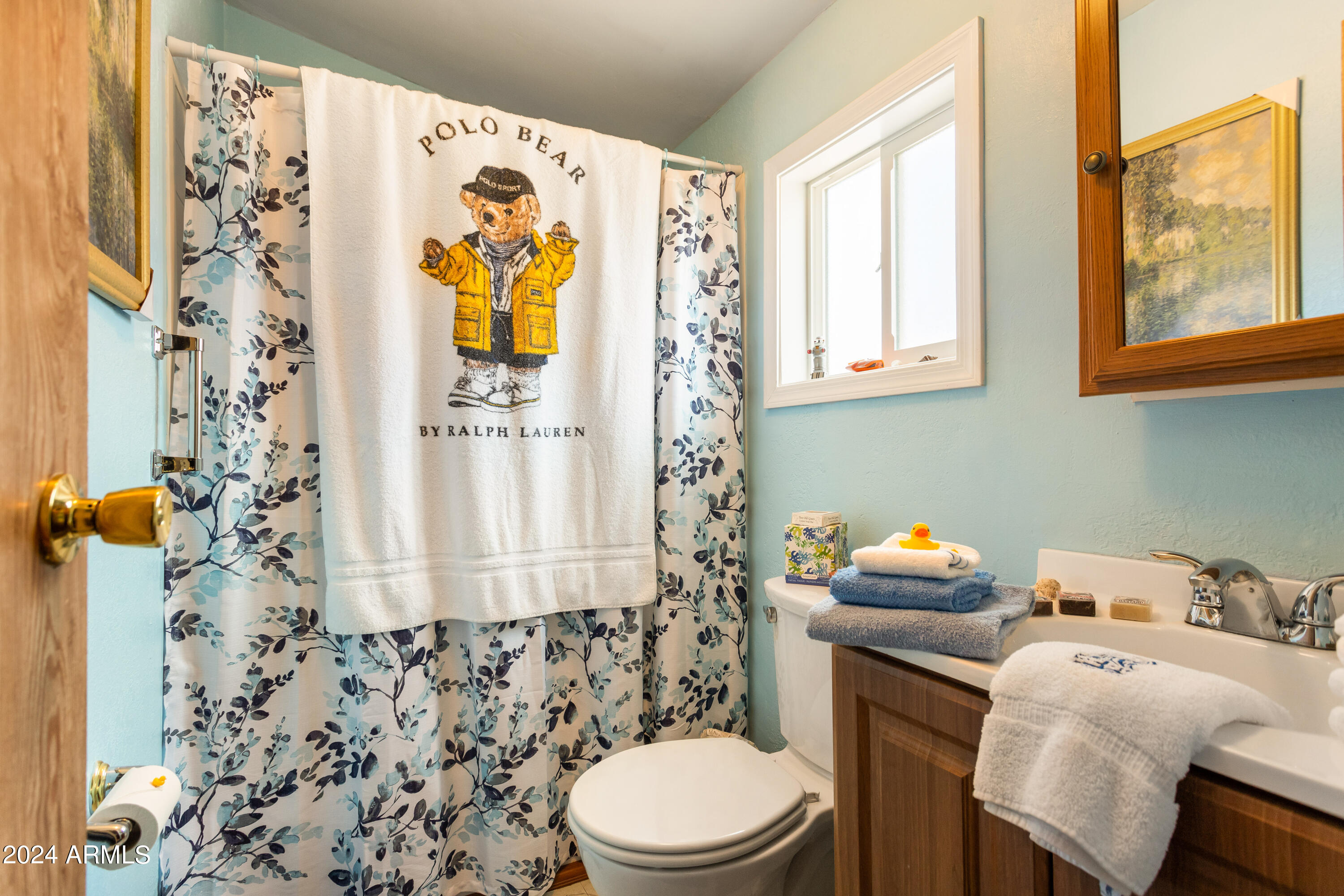 4500 Highway 80 Douglas, AZ 85607 - Photo 12 of 40 a bathroom with a sink toilet and shower
