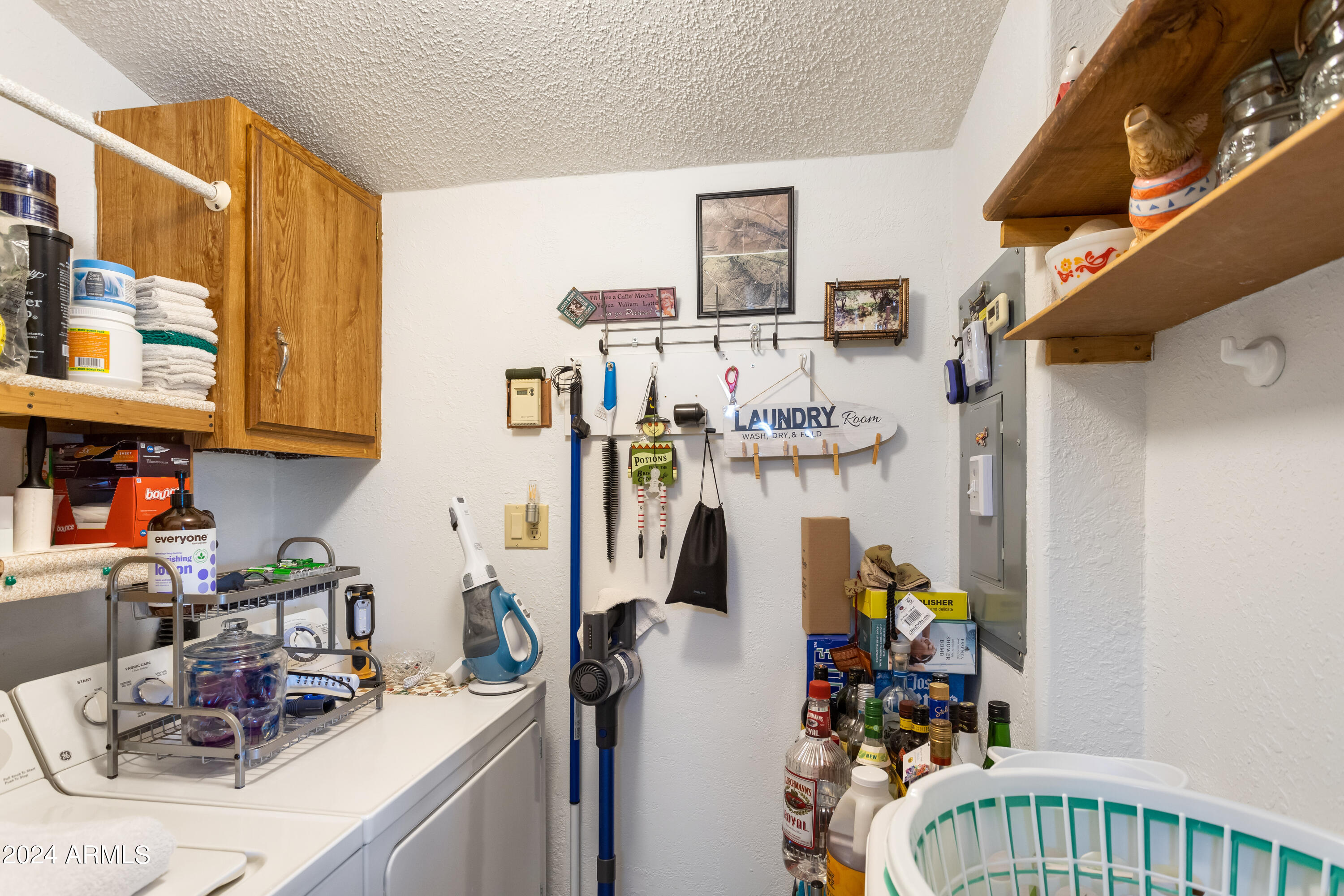 4500 Highway 80 Douglas, AZ 85607 - Photo 15 of 40 a view of storage and utility room with washer and dryer