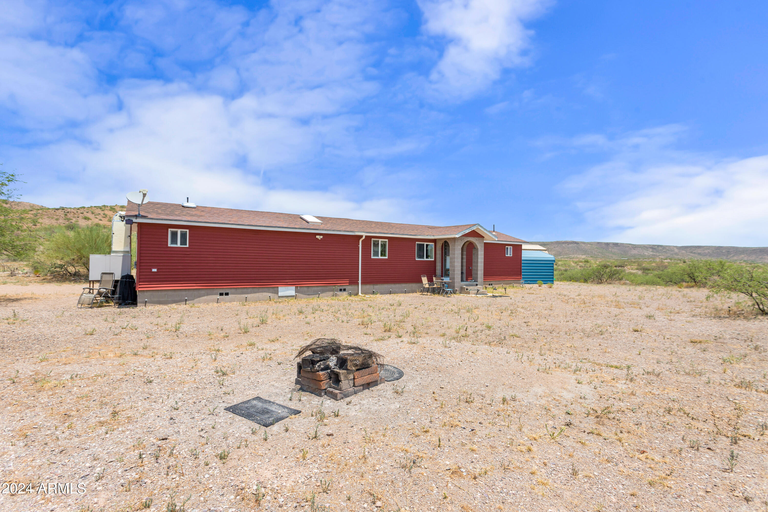 4500 Highway 80 Douglas, AZ 85607 - Photo 17 of 40 a front view of a house with a yard